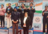 SS Sodhi posing along with medal winners during prize distribution ceremony.