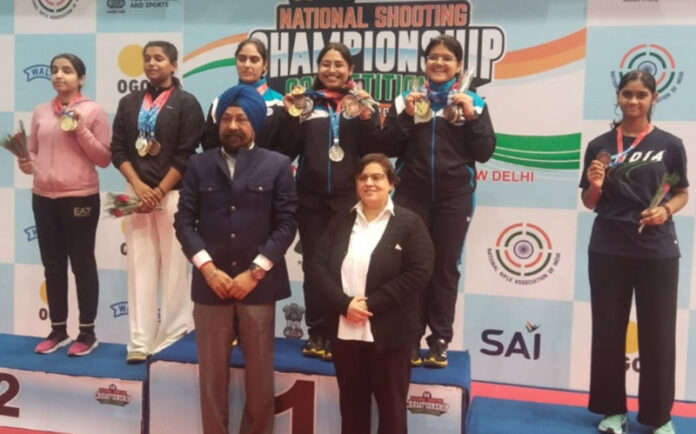 SS Sodhi posing along with medal winners during prize distribution ceremony.
