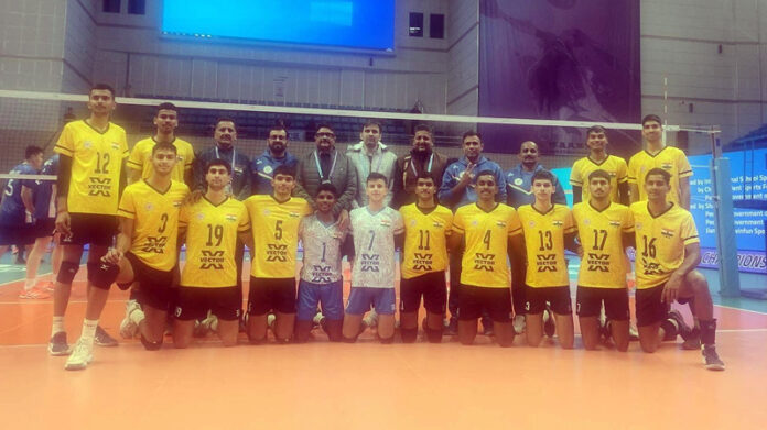 Indian Volleyball team posing for group photograph.