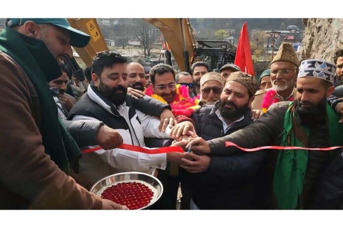 MLA Haveli, Ajaz Jan kick-starting Degree College road at Mandi on Monday. -Excelsior/Waseem MLA Haveli, Ajaz Jan kick-starting Degree College road at Mandi on Monday. -Excelsior/Waseem