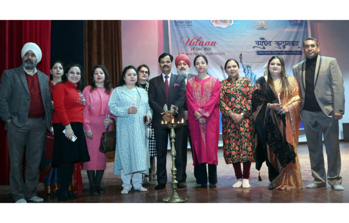 Dignitaries posing for group photograph during a programme.