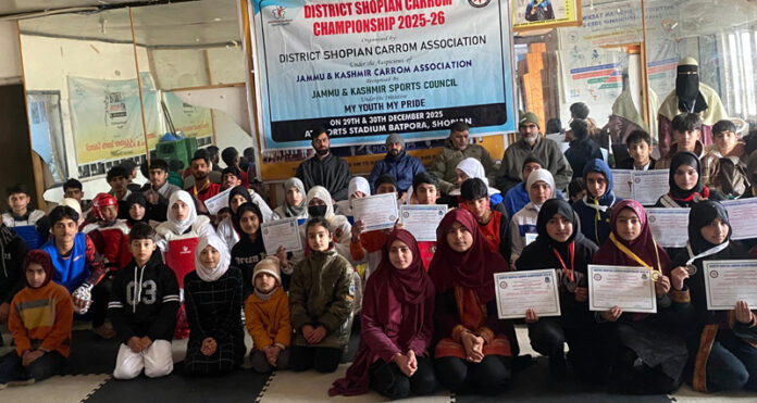 Winners posing along with medals and certificates.