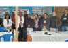 A team of doctors posing during a free medical camp organized by ASCOMS in Jammu.