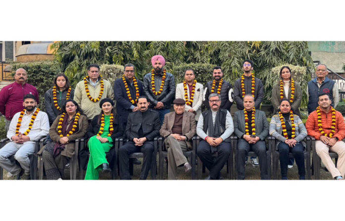 Newly elected office-bearers and executive members of Tawi Trekkers J&K posing for a group photograph.