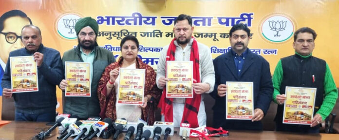 BJP leaders releasing a poster at Jammu.