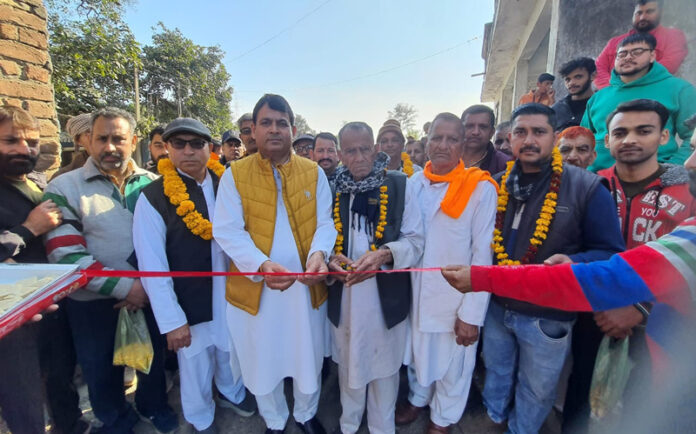 page11-2 DDC member, Pandit Suresh Sharma inaugurating road projects in Block Mera Mandreya on Thursday.