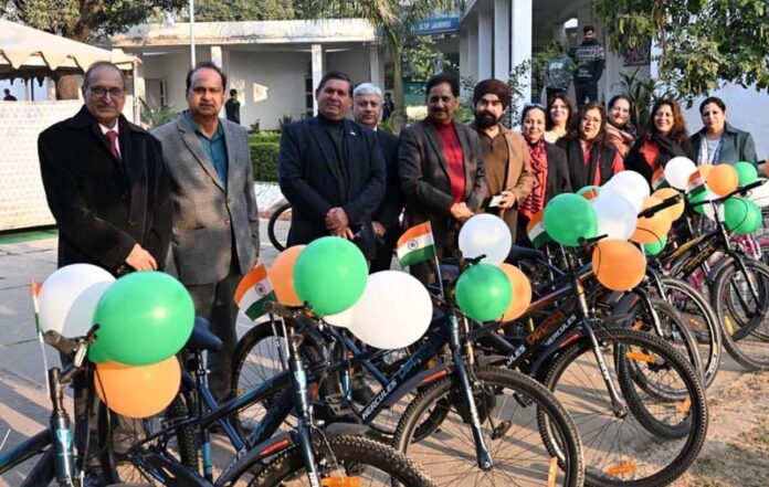Dignitaries from RC Jammu Tawi along with others during a function to distribute bicycles to the children of BSF martyrs in Jammu.