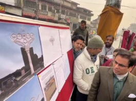 NC's chief spokesperson, Tanvir Sadiq lying foundation stone for illuminated landmark at Alamgari Bazar in Srinagar.