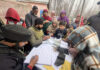 Doctors examining patients during a medical camp in Kulgam on Thursday.