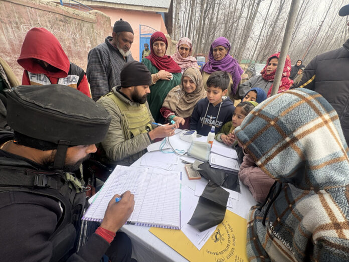 Doctors examining patients during a medical camp in Kulgam on Thursday.