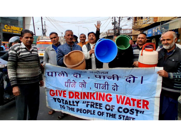 Sunil Dimple staging a demonstration against Jal Shakti Department on the Janipur-High Court Road on Saturday. Sunil Dimple staging a demonstration against Jal Shakti Department on the Janipur-High Court Road on Saturday.