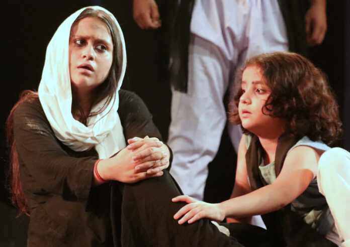 A scene from the play ‘Baba Jittmal’ staged in Jammu on Thursday.