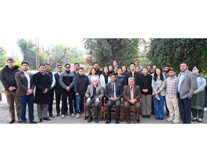 Dignitaries posing for photograph with Legal Assistants during training course on Monday.