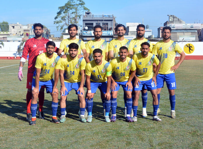 J&K football team posing for photograph.
