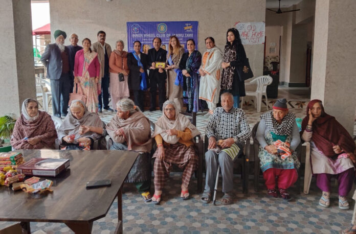 IWC Jammu Tawi team posing for a group photograph with Vridh Ashram, Ambphalla inmates on Friday.