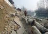 A view of collapsed road at Pethkundal in Shalbug area of central Kashmir’s Ganderbal district. -Excelsior/ Firdous Ahmad.