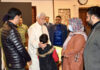 LG meeting families of Nowgam's accidental blast martyrs on Friday.