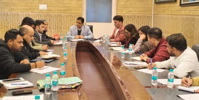 Director Tourism chairing a meeting at Jammu on Tuesday.