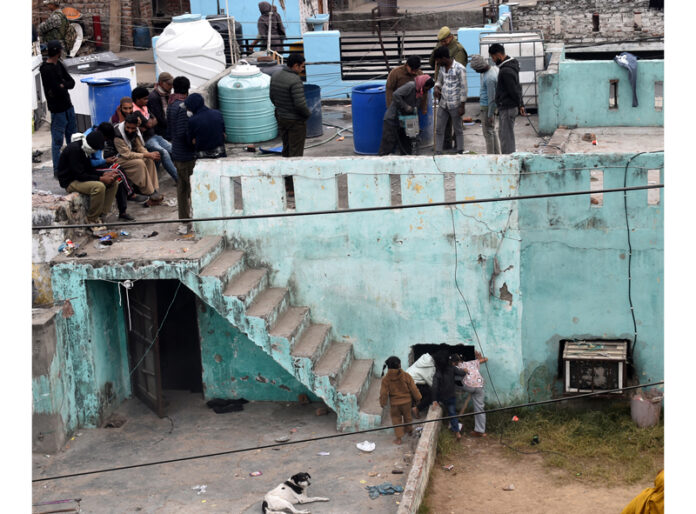 A house being demolished at Rajiv Nagar amid heavy deployment of police on Saturday. — Excelsior/Rakesh