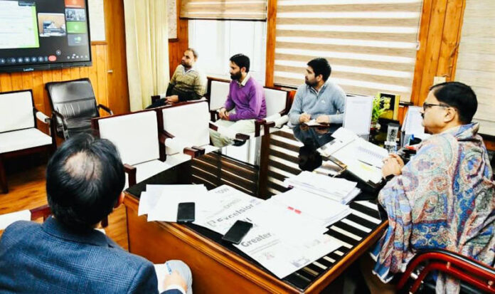 Javed Rana chairing virtual review meeting on Friday