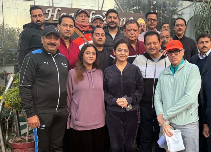 CM Omar Abdullah posing with newly elected team of Amar Singh Club in Jammu.