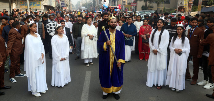 Merry Christmas procession being taken out in Jammu on Monday by Joint Chruches Fellowship Christmas Community. — Excelsior / Rakesh