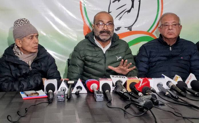 CWC member and AICC in-charge Ajay Kumar Lallu, along with JKPCC President Tariq Hameed Karra and Nizamuddin Bhat, during a press conference in Srinagar on Monday. —Excelsior/Shakeel