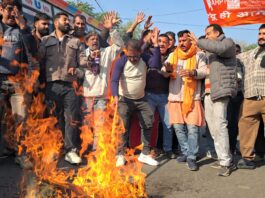 Rashtriya Bajrang Dal activists torching an effigy during protest at Jammu on Thursday. -Excelsior/Rakesh