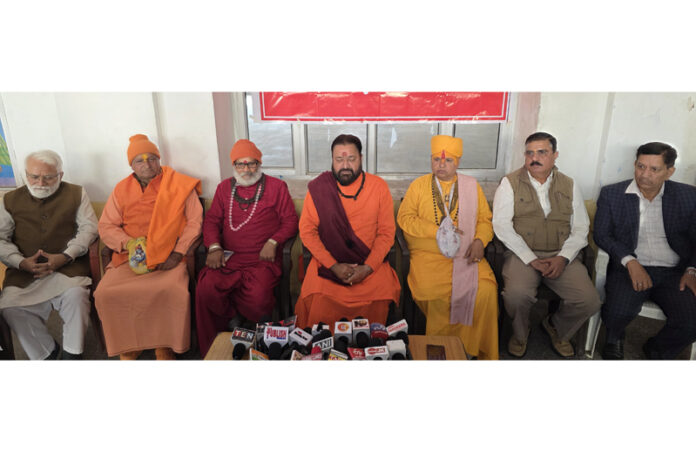 Members of Sangarsh Samiti and allied bodies talking to media persons after joint meeting on Monday. —Excelsior/Rakesh