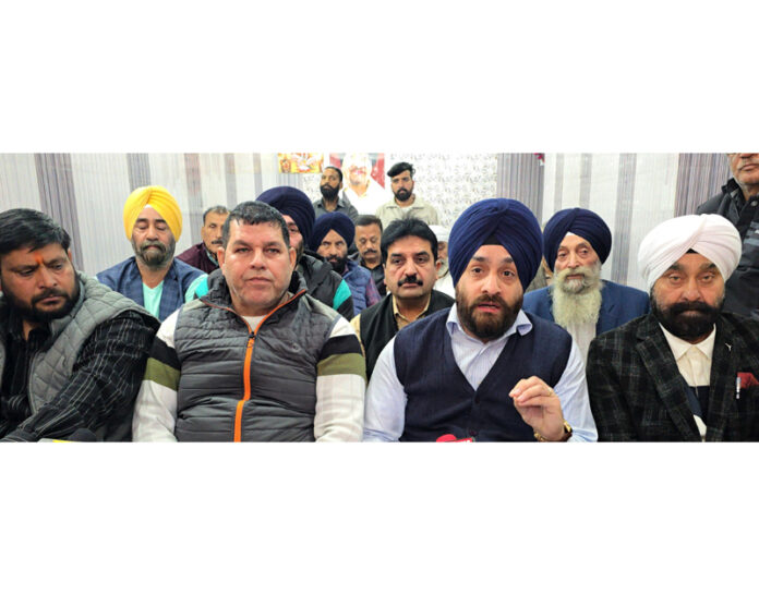 AJKTWA chairman Karan Singh Wazir addressing press conference in Jammu. —Excelsior/Rakesh AJKTWA chairman Karan Singh Wazir addressing press conference in Jammu. —Excelsior/Rakesh