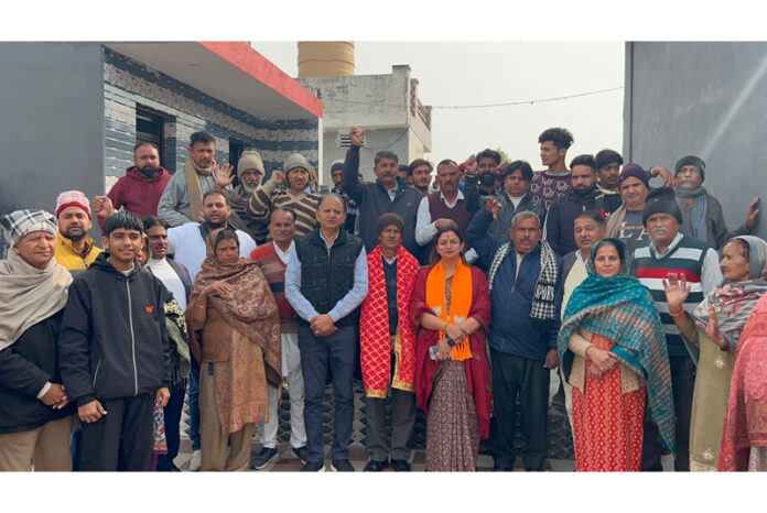 BJP leader Rekha Mahajan posing alongwith others during a function in Samba.