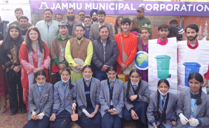 JMC Commissioner with participating students and officials during wall art activity at Jewel Chowk.