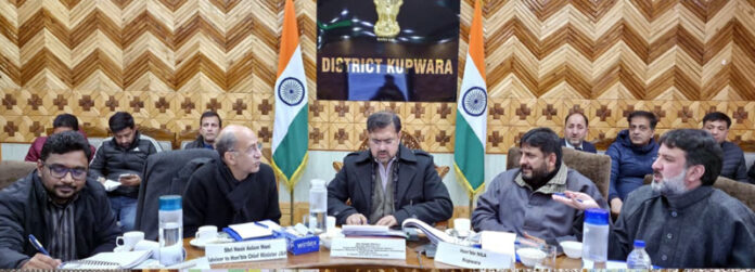 Minister Satish Sharma chairing a meeting at Kupwara. Minister Satish Sharma chairing a meeting at Kupwara.