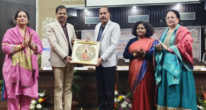 Prof J P Singh Joorel, Dean Academic Affairs, JU presenting a memento during a function at JU.