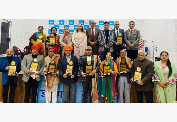 Eminent personalities honoured during function by Dogri Sanstha Jammu on Sunday.