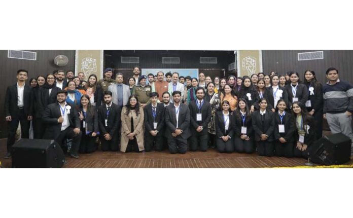 Dignitaries posing for a group photograph during the function organized at JU.