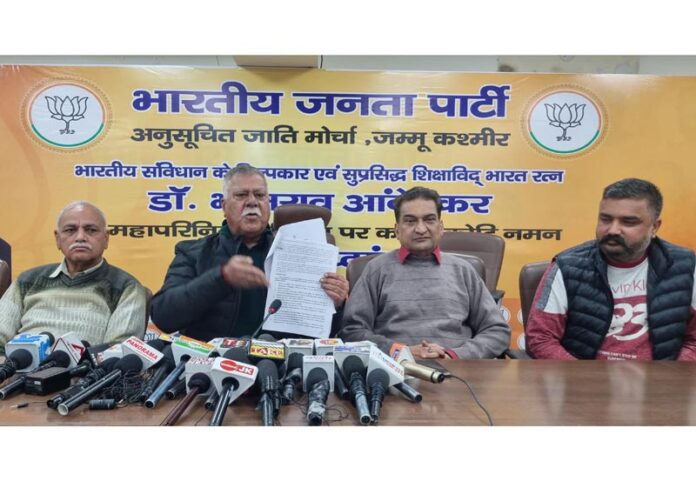 Former Minister and senior BJP leader, Ch Sukhnandan Kumar and party spokesperson, Balbir Ram Rattan at a press conference at Jammu on Tuesday.