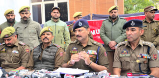 SP Jammu South Ajay Sharma addressing a press conference at Police Station Gandhi Nagar, Jammu. -Excelsior/Rakesh