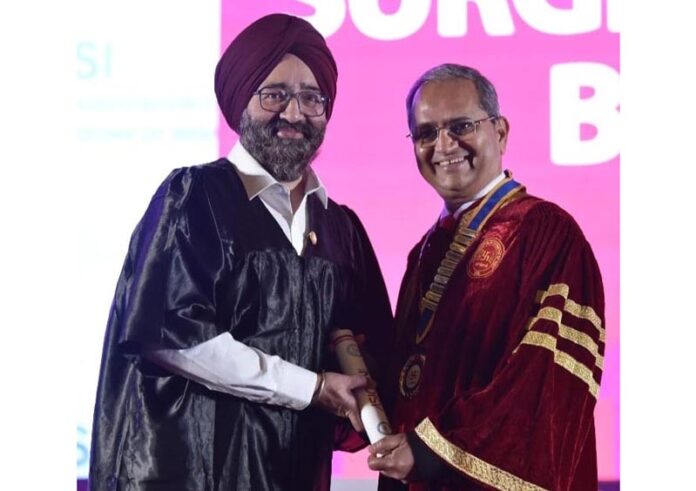 Dr Harbinder Singh Bali receiving Fellowehip of Surgery at ASICON 2025 in Kolkata.