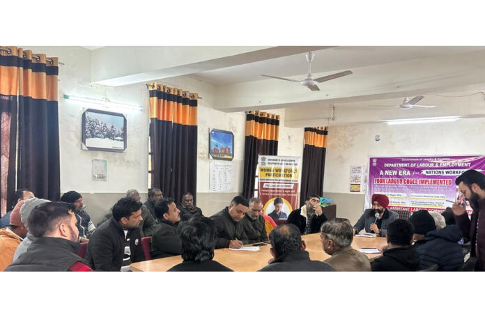 DLC Jammu, other Labour officers and representatives of trade unions during an awareness session at Jammu.