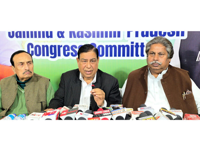 Senior Cong leaders Raman Bhalla, Ravinder Sharma, Ved mahajan addressing joint press conference in Jammu. — Excelsior/Rakesh