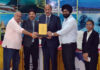 J&K Tourism Department officers receiving award at IITE Madurai.