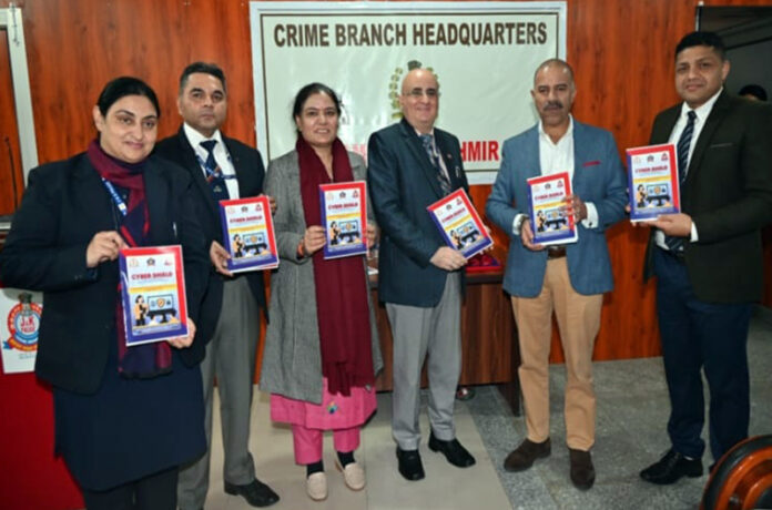 DGP Nalin Prabhat releasing Crime Branch's booklet 'Cyber Shield' at the organization's headquarters in Jammu on Sunday.