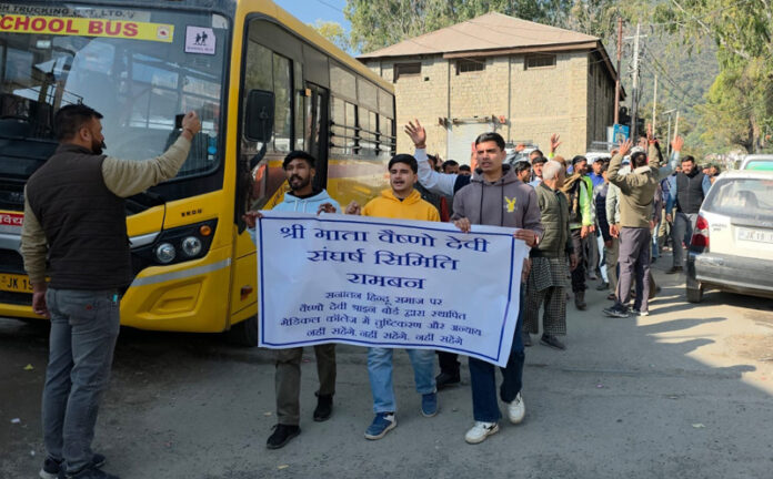 Protesters raising slogans at Shri Mata Vaishno Devi Sangharsh Samiti led rally in Ramban on Tuesday.