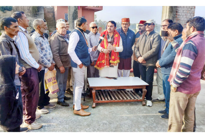 MLA R S Pathania holding interactive and consultative session at Roundmail Gaushala on Sunday.