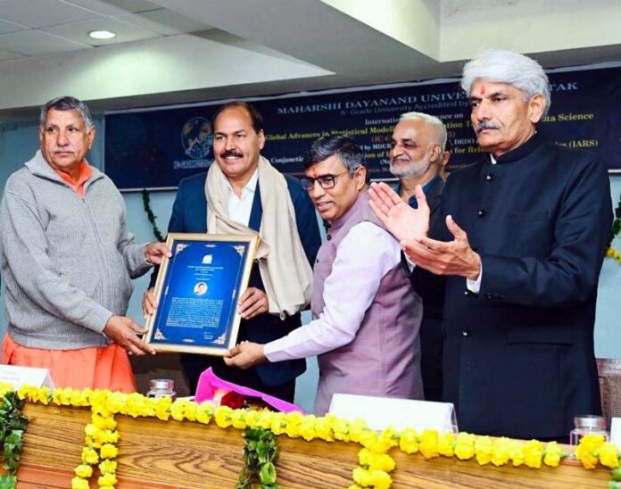 Prof J P Singh Joorel being conferred with Lifetime Achievement Award by IARS.