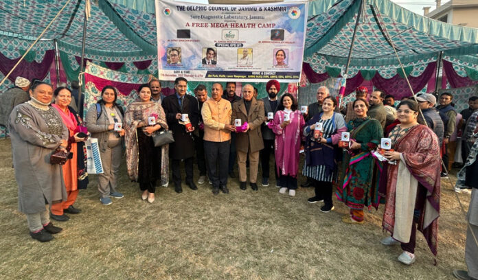 Organizers along with doctors and beneficiaries during a mega health camp at JDA Park Muthi, Jammu. Organizers along with doctors and beneficiaries during a mega health camp at JDA Park Muthi, Jammu.