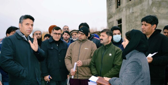 DC Budgam during visit to Pandit Colony Sheikhpora on Monday.