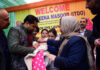Minister Sakeena Itoo administering pulse polio drop at a toddler in Jammu on Sunday.