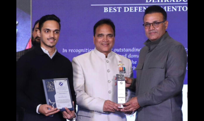 Submariner Sandeep Gupta being presented with an award by dignitaries in New Delhi on Thursday.